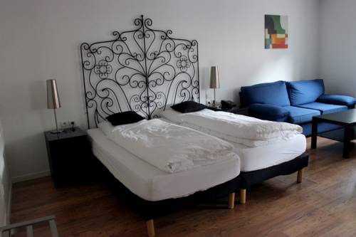 Imagen de la habitación del H&ocirc;tel La Maison Rouge. Foto 12