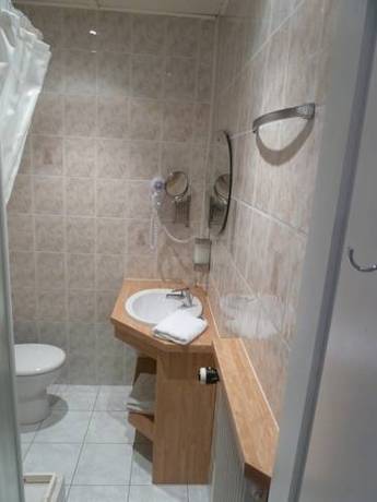 Imagen de la habitación del H&ocirc;tel La Maison Rouge. Foto 14