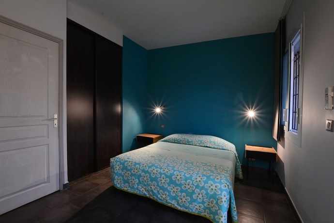 Imagen de la habitación del Hôtel La Palma. Foto 4