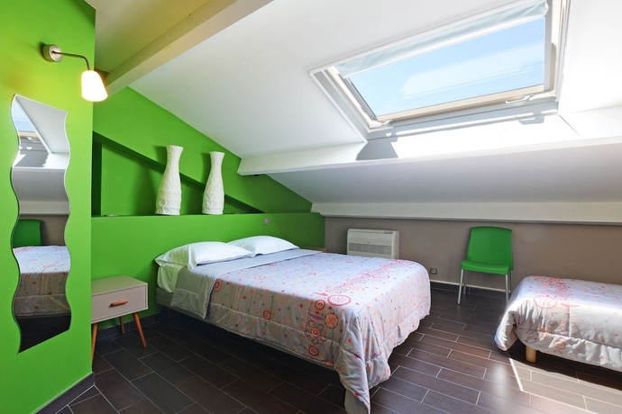 Imagen de la habitación del Hôtel La Palma. Foto 11
