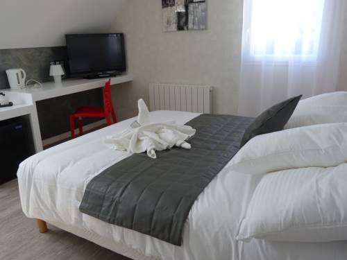 Imagen de la habitación del H&ocirc;tel La Palmeraie, Benouville. Foto 7