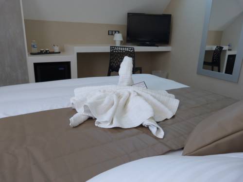 Imagen de la habitación del H&ocirc;tel La Palmeraie, Benouville. Foto 9