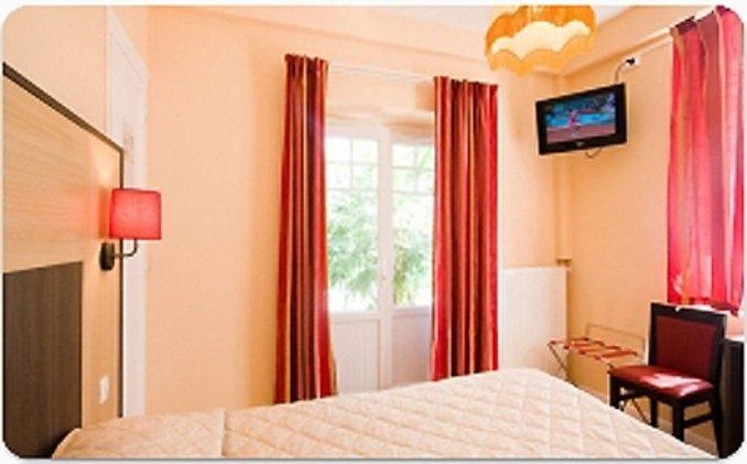 Imagen de la habitación del Hôtel La Palmeraie. Foto 3
