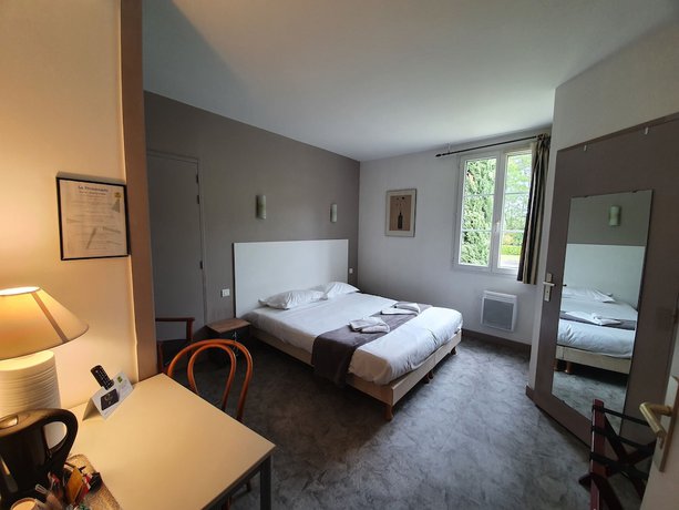 Imagen de la habitación del H&ocirc;tel La Promenade. Foto 14