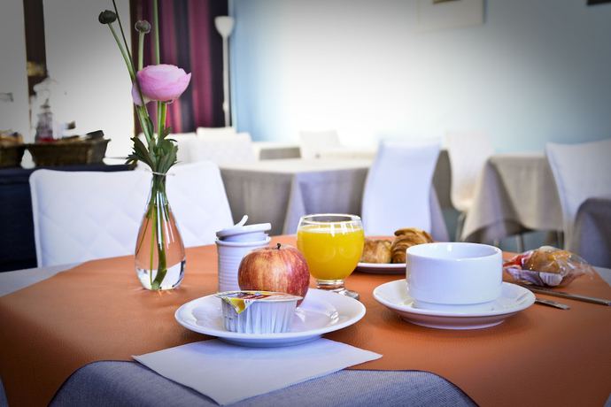 Imagen del bar/restaurante del H&ocirc;tel Le Comty. Foto 5