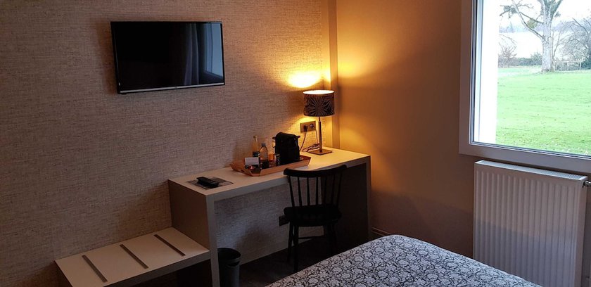 Imagen de la habitación del Hôtel Le Corbusson. Foto 14