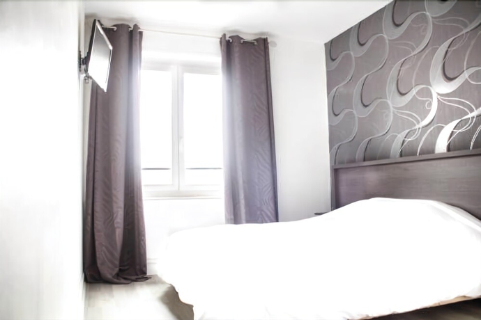 Imagen de la habitación del Hôtel Le Jardin. Foto 3