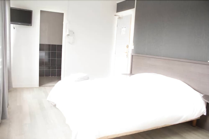 Imagen de la habitación del Hôtel Le Jardin. Foto 8