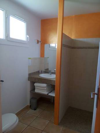 Imagen de la habitación del Hôtel Le Mas Des Quintrands. Foto 3