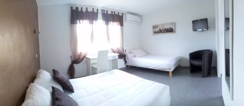 Imagen de la habitación del Hôtel Le Mas Des Quintrands. Foto 8