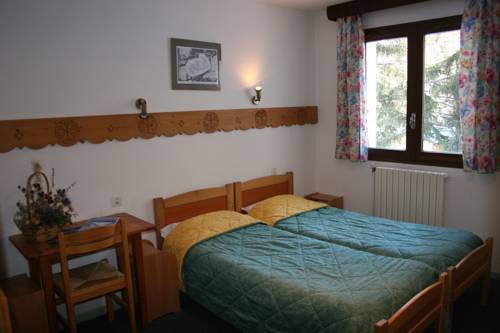 Imagen de la habitación del Hôtel Le Monte Pente. Foto 14