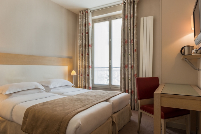 Imagen de la habitación del Hôtel Le Petit Belloy St Germain. Foto 2