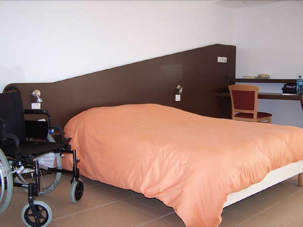 Imagen de la habitación del Hôtel Le Richevaux. Foto 2