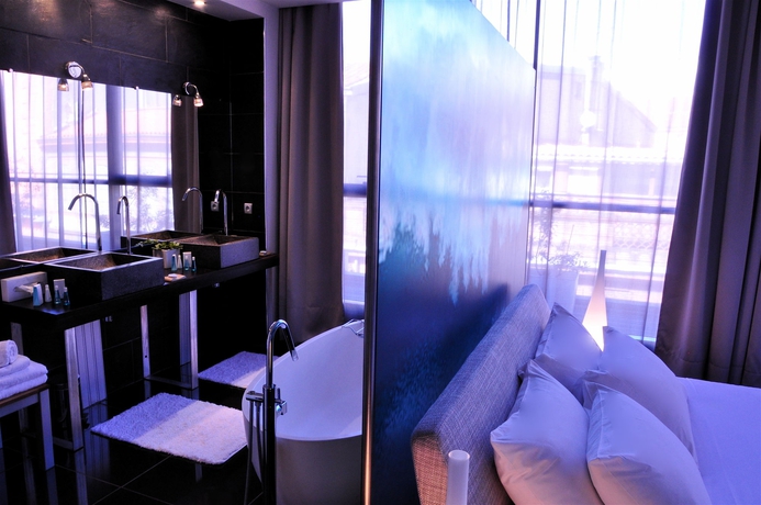 Imagen de la habitación del H&ocirc;tel Les Bains Douches. Foto 2