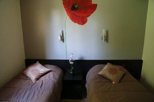 Imagen de la habitación del H&ocirc;tel Les Beaux Soleils. Foto 11