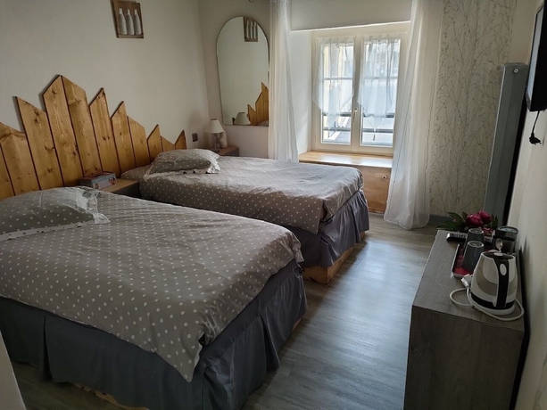 Imagen de la habitación del H&ocirc;tel Les Remparts, Champagnole. Foto 7