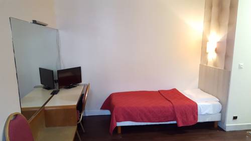 Imagen de la habitación del H&ocirc;tel M&eacute;dia. Foto 4