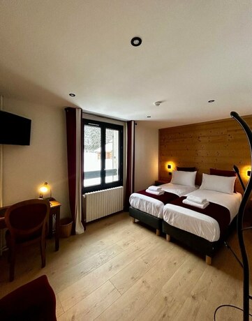 Imagen de la habitación del H&ocirc;tel Restaurant Le Madame. Foto 13