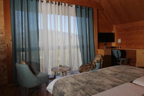 Imagen de la habitación del H&ocirc;tel Restaurant Les Alisiers. Foto 8