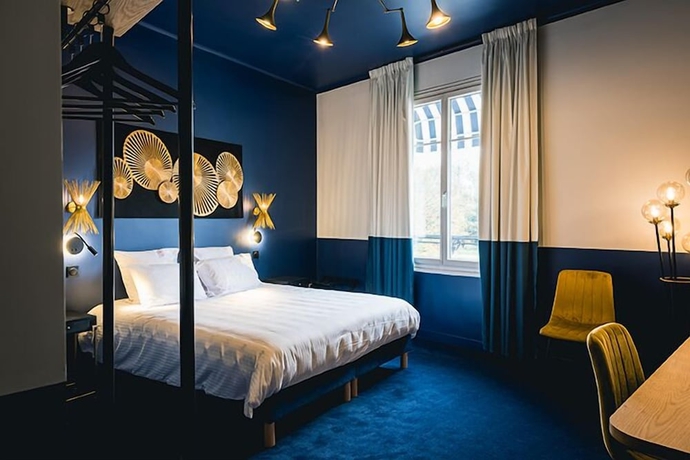 Imagen de la habitación del Hôtel Saint Christophe, Houdan. Foto 1