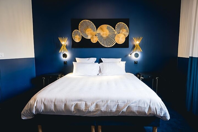 Imagen de la habitación del H&ocirc;tel Saint Christophe, Houdan. Foto 2