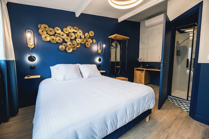 Imagen de la habitación del H&ocirc;tel Saint Christophe, Houdan. Foto 5