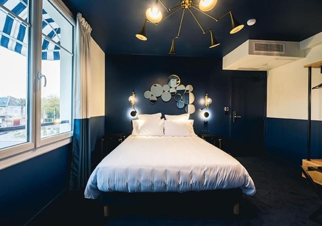 Imagen de la habitación del H&ocirc;tel Saint Christophe, Houdan. Foto 7