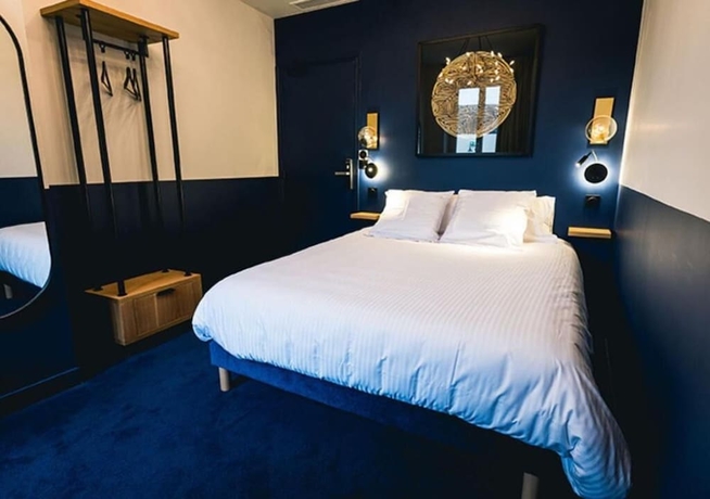 Imagen de la habitación del H&ocirc;tel Saint Christophe, Houdan. Foto 8