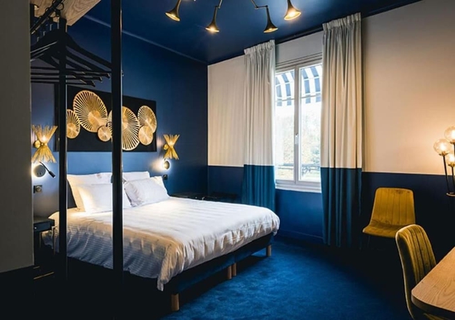 Imagen de la habitación del H&ocirc;tel Saint Christophe, Houdan. Foto 9