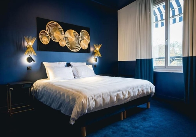 Imagen de la habitación del H&ocirc;tel Saint Christophe, Houdan. Foto 10