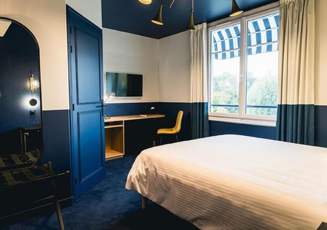 Imagen de la habitación del H&ocirc;tel Saint Christophe, Houdan. Foto 11
