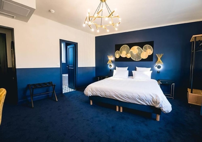 Imagen de la habitación del H&ocirc;tel Saint Christophe, Houdan. Foto 13