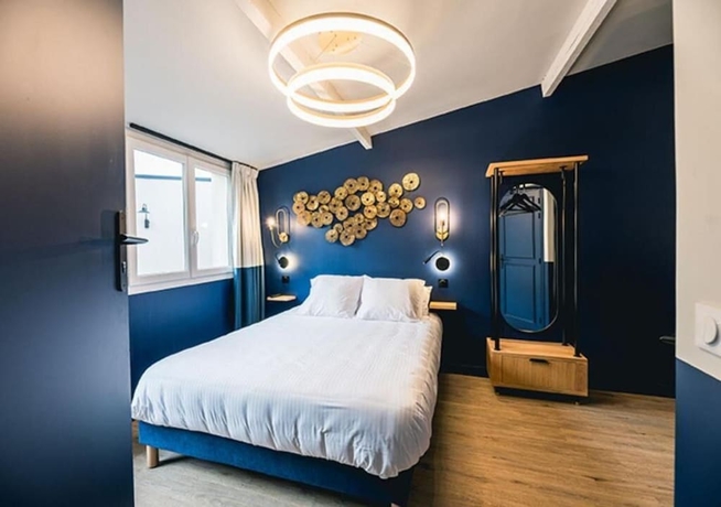 Imagen de la habitación del H&ocirc;tel Saint Christophe, Houdan. Foto 14