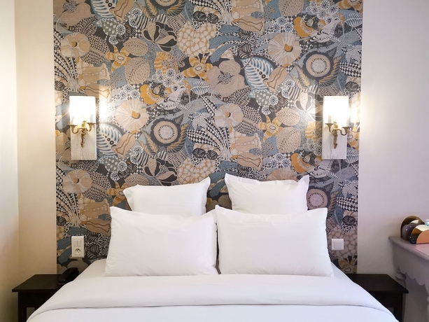 Imagen de la habitación del H&ocirc;tel Sous Les Figuiers. Foto 9
