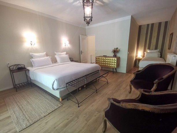 Imagen de la habitación del H&ocirc;tel Sous Les Figuiers. Foto 14