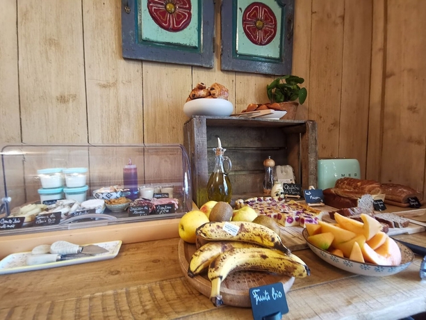 Imagen del bar/restaurante del H&ocirc;tel Sous Les Figuiers. Foto 3