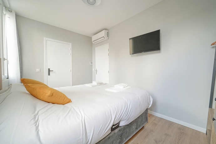 Imagen de la habitación del H&ocirc;tel Trianon Saint Ouen. Foto 5