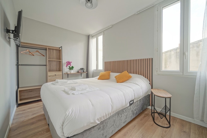 Imagen de la habitación del H&ocirc;tel Trianon Saint Ouen. Foto 6