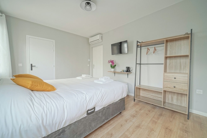 Imagen de la habitación del H&ocirc;tel Trianon Saint Ouen. Foto 8