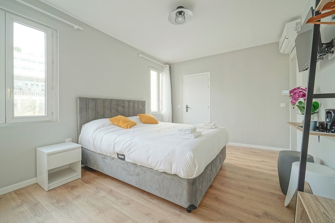 Imagen de la habitación del H&ocirc;tel Trianon Saint Ouen. Foto 9