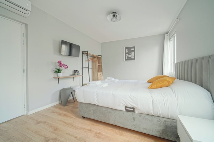 Imagen de la habitación del H&ocirc;tel Trianon Saint Ouen. Foto 12