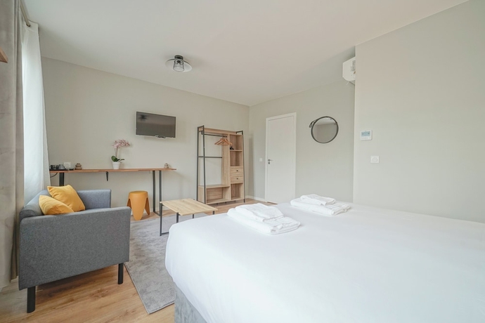 Imagen de la habitación del H&ocirc;tel Trianon Saint Ouen. Foto 13