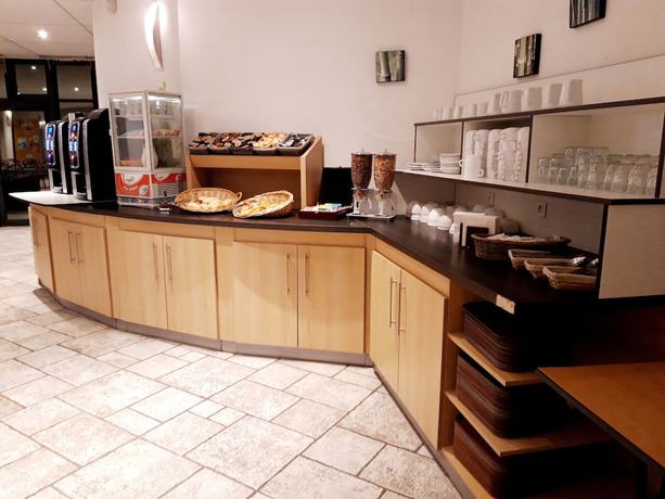 Imagen del bar/restaurante del Hôtel and Résidence Futuroscope. Foto 2