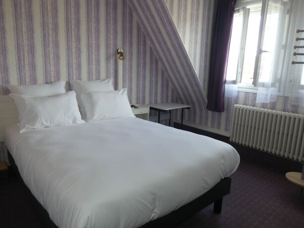 Imagen de la habitación del H&ocirc;tel de France, Pont-l'Eveque. Foto 13