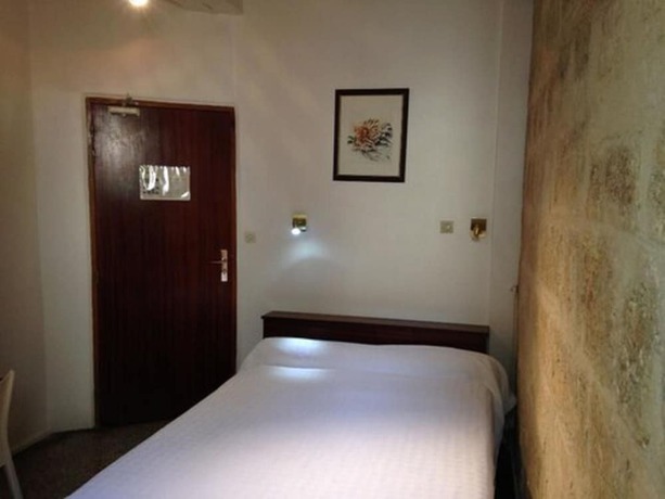 Imagen de la habitación del H&ocirc;tel des Etuves. Foto 10