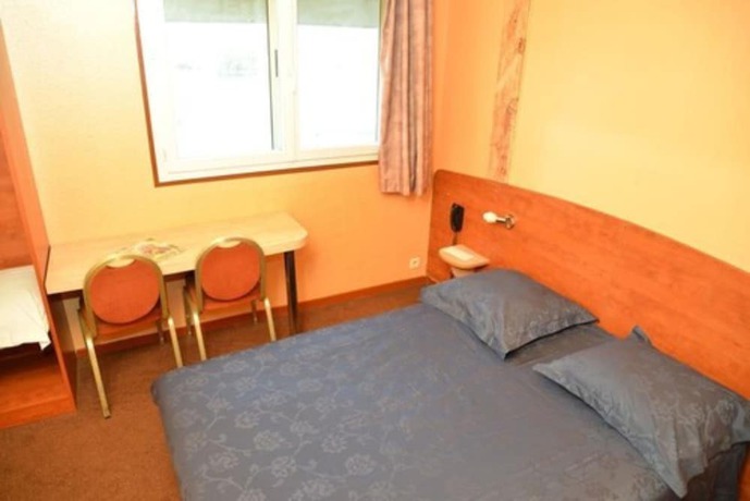 Imagen de la habitación del H&ocirc;tel le Cheval Noir. Foto 2