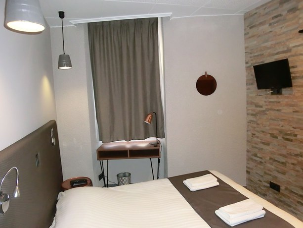 Imagen de la habitación del H&ocirc;tel sur le Quai. Foto 11