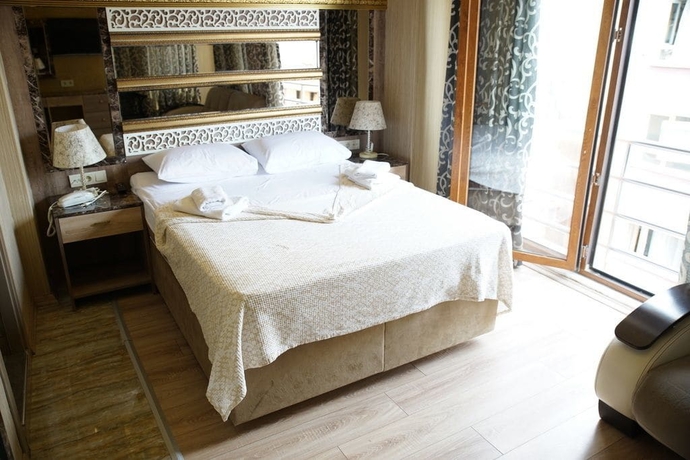 Imagen de la habitación del Holiday Business Otel. Foto 9