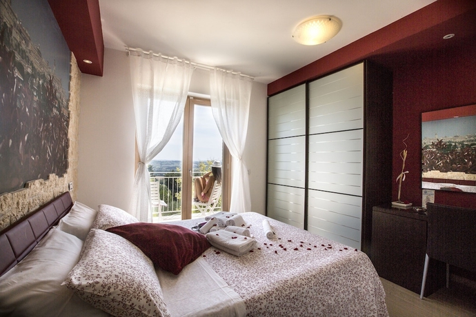 Imagen de la habitación del Holiday Residence Belohorizonte. Foto 2