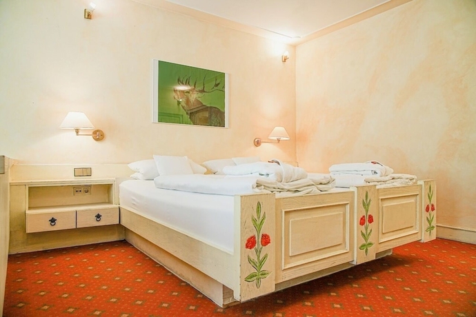 Imagen de la habitación del Holzschuh Schwarzwaldhotel. Foto 3